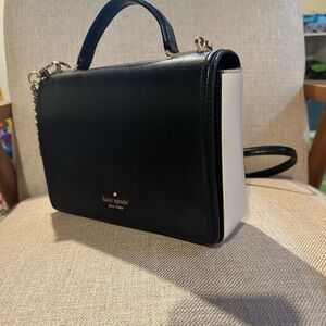 KATE SPADE black and white shoulder bag.